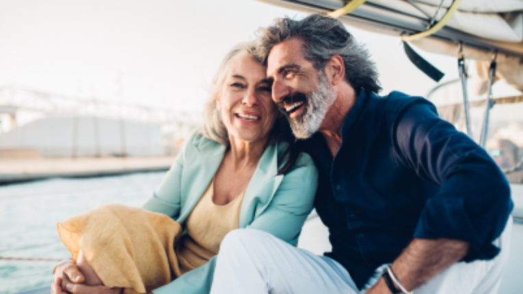 Mature couple on a sailboat