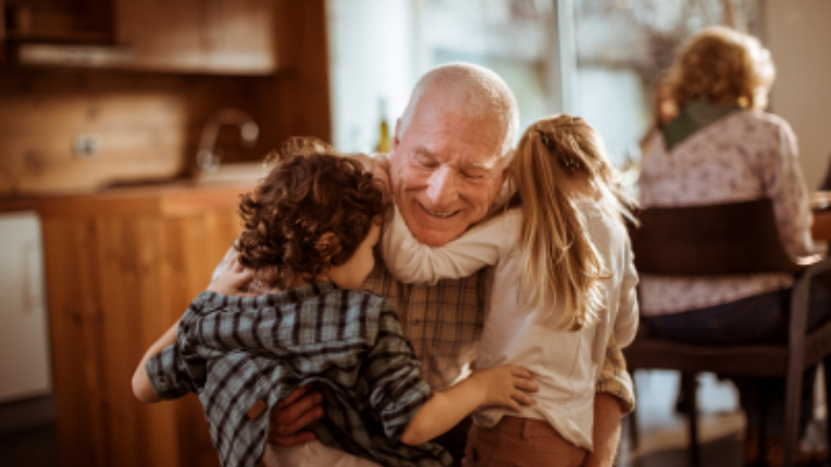 Grandfather playing with grandkids