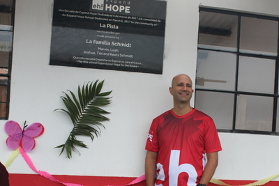 Marvin Schmidt in front of an expand hope building